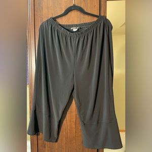 Flowing black capris with detail on the back. L